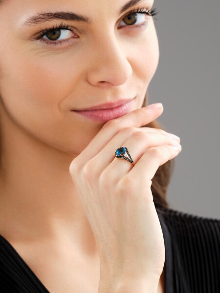 Yellow gold ring with diamonds and topaz (London blue) - fineness 14 K