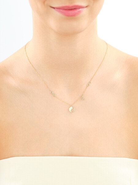 Naszyjnik z żółtego złota z diamentami - yin yang, nieskończoność - 0,01 ct - próba 375