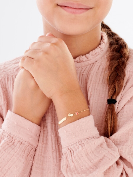 Złota bransoletka z blaszką, emalią, ankier - piesek, łapka