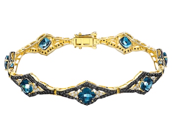 Gold bracelet with diamonds and topaz - fineness 14 K
