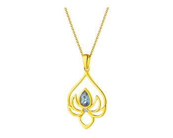 Zawieszka z żółtego złota z diamentem i topazem (London Blue) - kwiat lotosu 0,006 ct - próba 585