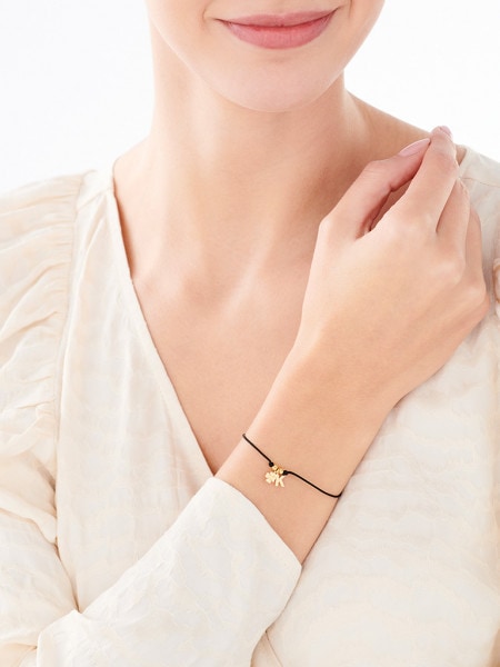 Bracelet with silver elements - letter K, clover