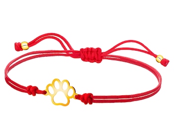 Bracelet with elements of yellow gold - paw