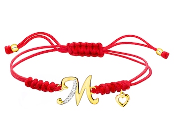 Bracelet with elements of yellow gold with a diamond - letter M, heart 0,003 ct - fineness 9 K