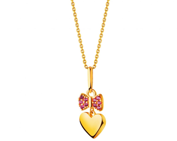 Gold pendant with zircons - heart, bow