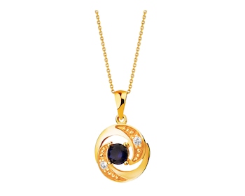 Gold pendant with synthetic sapphire and zircons