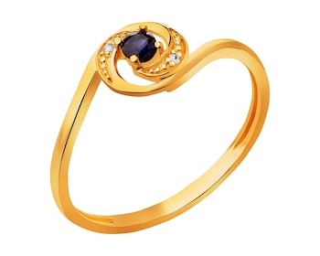 Gold ring with synthetic sapphire and cubic zirconia