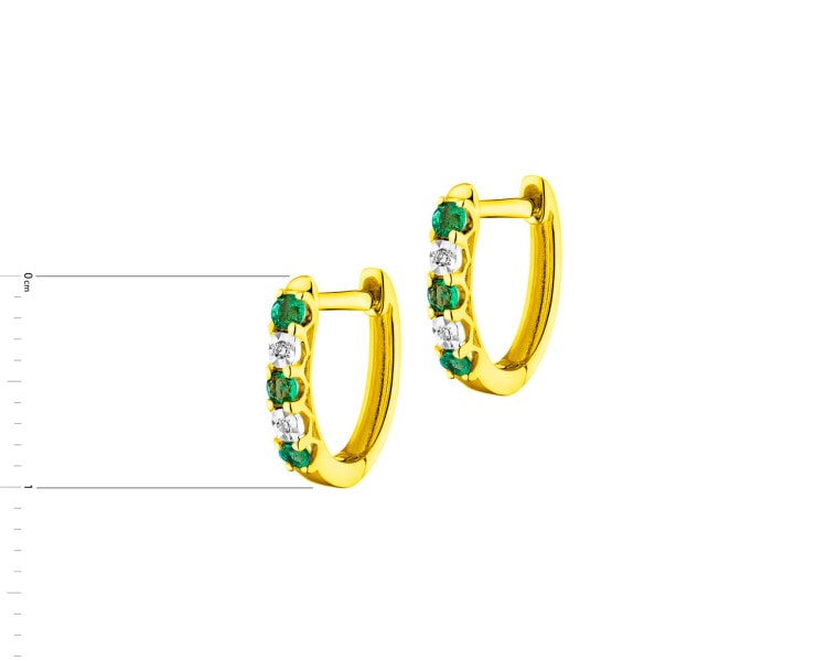 Gold earrings with diamonds and emeralds - fineness 14 K