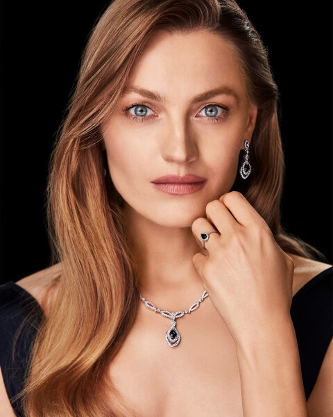 14 K Rhodium-Plated White Gold Ring with Diamonds - fineness 14 K