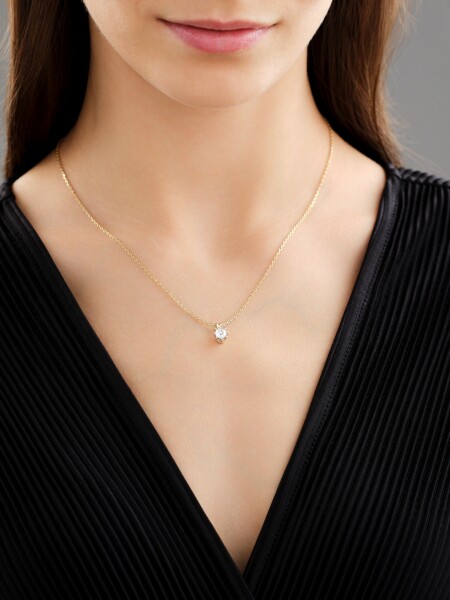 White and yellow gold pendant with brilliant - 0,50 ct - fineness 585