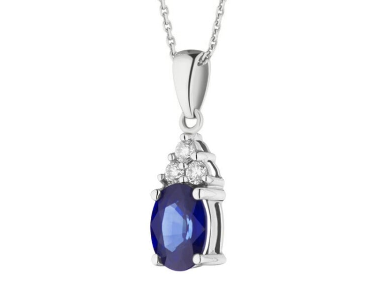 Yellow and white gold pendant with brilliants and sapphire - fineness 14 K