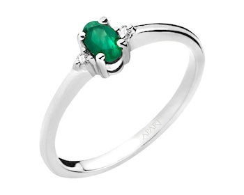 White gold ring with brilliants and emerald - fineness 14 K
