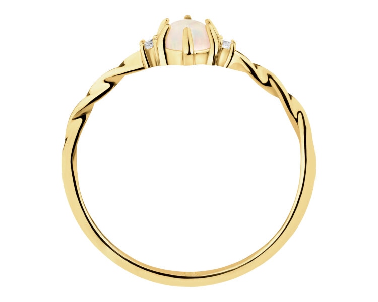 Złoty pierścionek z opalem syntetycznym i cyrkoniami