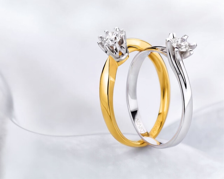 Yellow and white gold ring with brilliant 0,28 ct - fineness 585