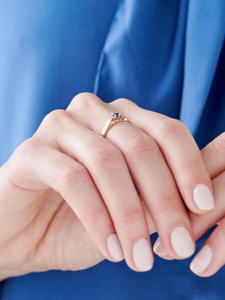 Yellow and white gold ring with brilliants and sapphire - fineness 585