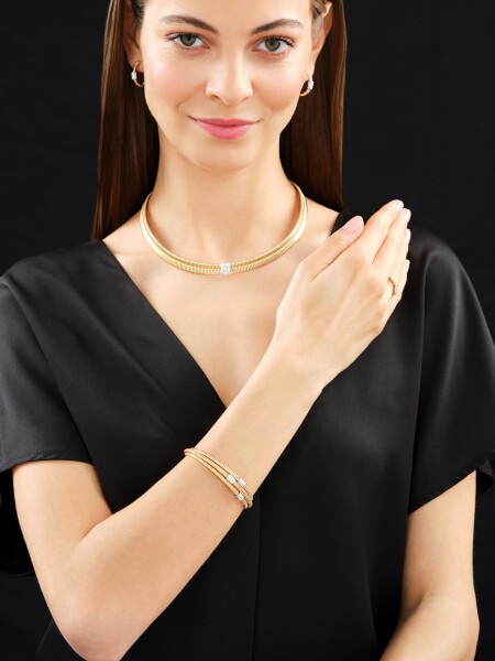 Náramek ze žlutého a bílého zlata s brilianty - 0,38 ct - ryzost 750