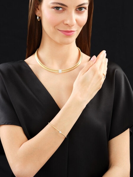 Náramek ze žlutého a bílého zlata s brilianty - 0,13 ct - ryzost 750