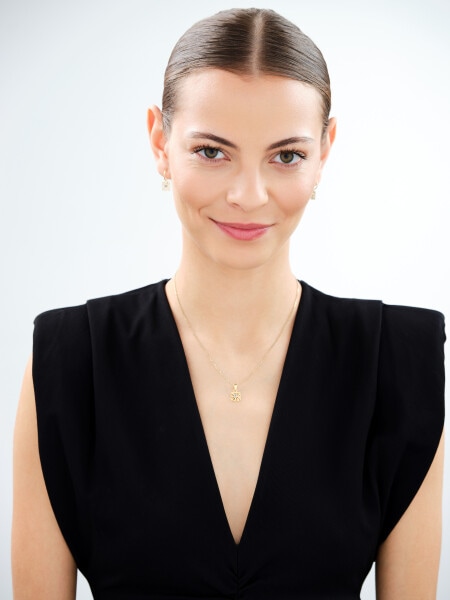 Złota zawieszka z cyrkonią