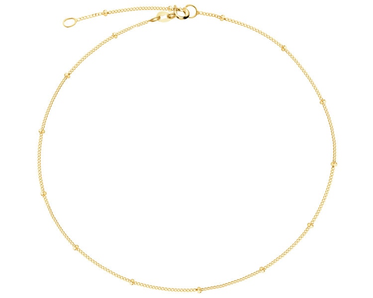 Złota bransoletka na nogę - kulki