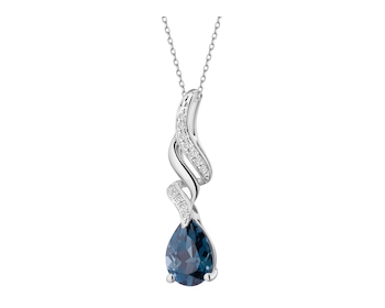 Zawieszka z białego złota z diamentami i topazem London Blue - próba 585