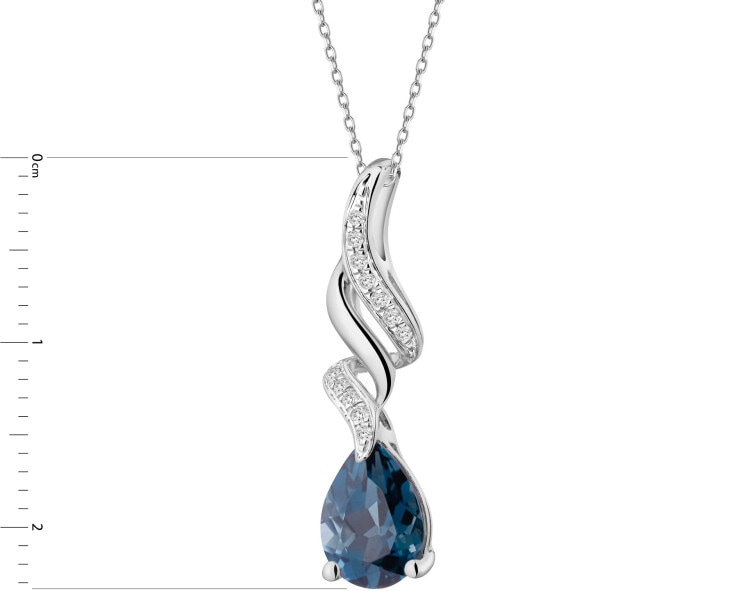 Zawieszka z białego złota z diamentami i topazem London Blue - próba 585