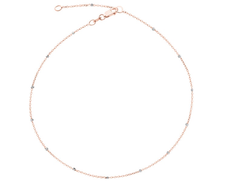 Złota bransoletka na nogę