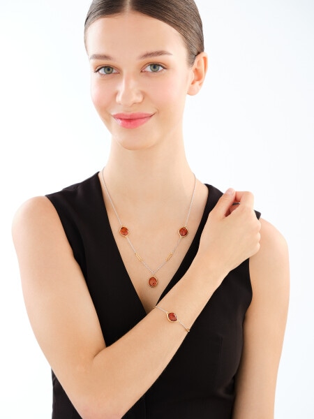 Stříbrný náhrdelník s pozlacenými prvky a janterem