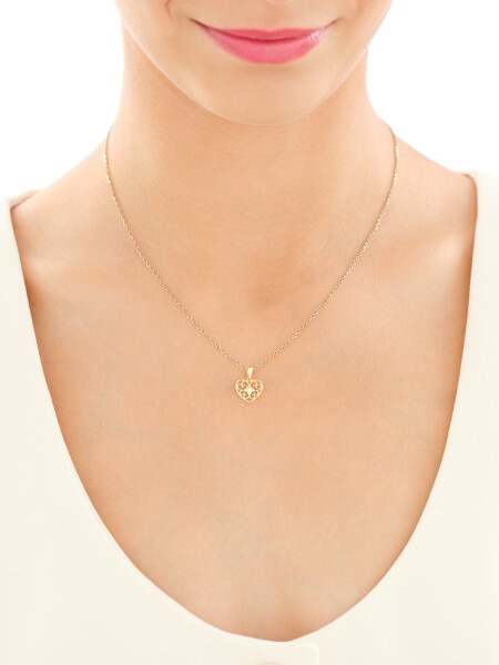 Zawieszka i kolczyki z żółtego złota z diamentami - komplet - serca - 0,01 ct - próba 375