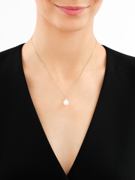 Zawieszka z żółtego złota z diamentami i perłą - próba 375