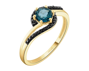 Zlatý prsten s černými brilianty a topazem London Blue - ryzost 585