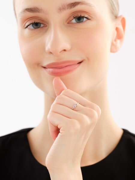 Pierścionek z żółtego złota z diamentami - nieskończoność - 0,02 ct - próba 375