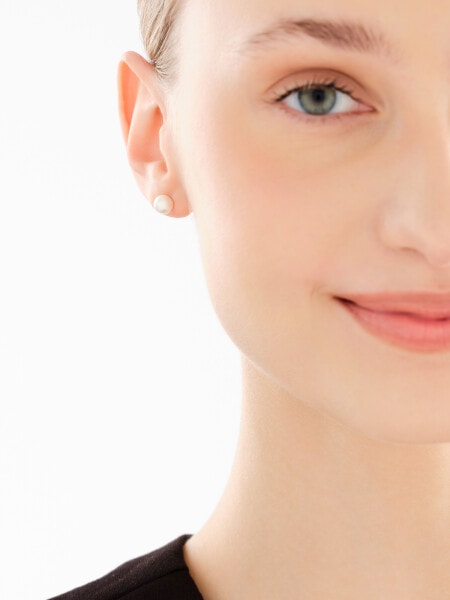 Złote kolczyki z perłami