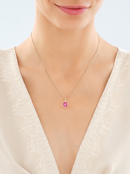 Złota zawieszkla z topazem