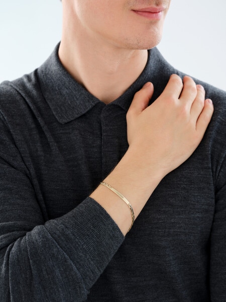 Zlatý náramek s destičkou