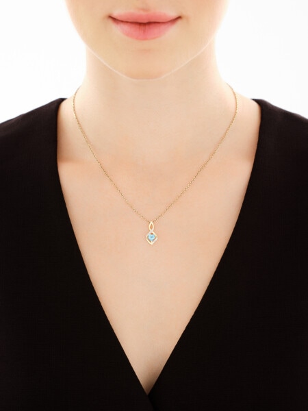 Zawieszka z żółtego złota z diamentami i topazem - serce - 0,006 ct - próba 375