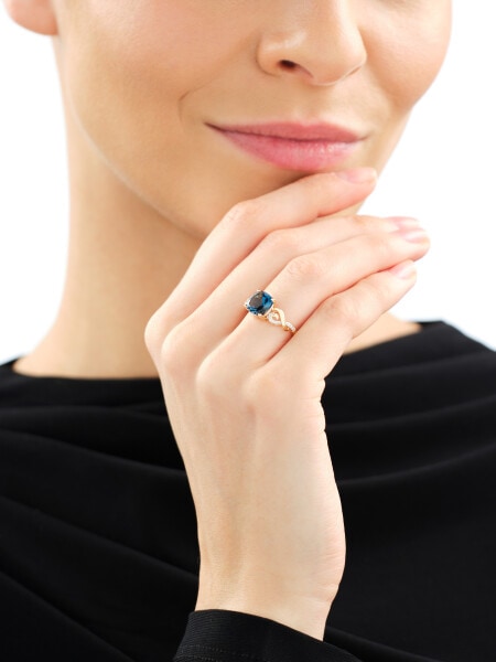 Zlatý prsten s diamanty a topazem London Blue - ryzost 585