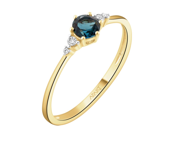Pierścionek z żółtego złota z brylantami i topazem London Blue - próba 585