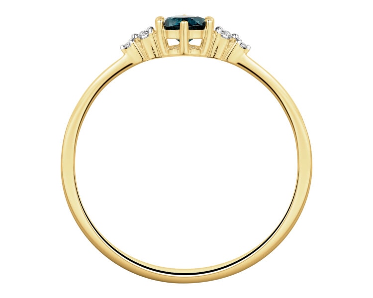 Pierścionek z żółtego złota z brylantami i topazem London Blue - próba 585
