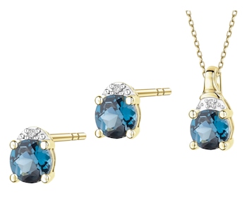 Zawieszka i kolczyki z żółtego złota z diamentami i topazami London Blue - komplet - próba 375