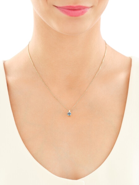 Zawieszka i kolczyki z żółtego złota z diamentami i topazami London Blue - komplet - próba 375