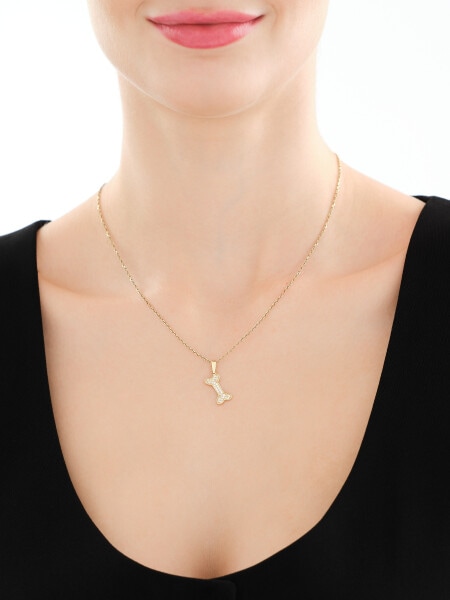 Złota zawieszka z cyrkoniami - kość