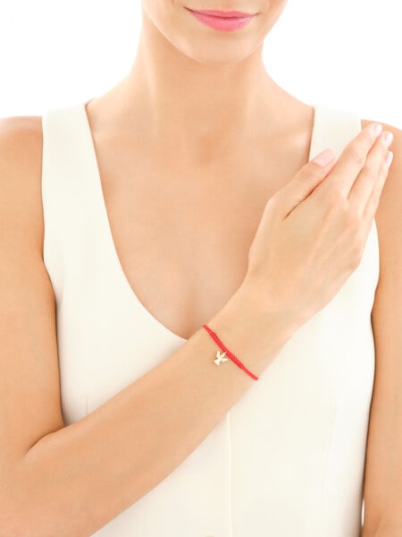 Bransoletka z elementami żółtego złota i diamentem - aniołek - 0,003 ct - próba 375