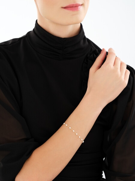 Złota bransoletka z perłami