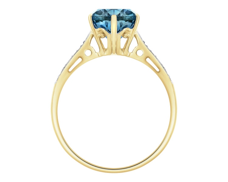 Pierścionek z żółtego złota z diamentami i topazem London Blue - próba 585