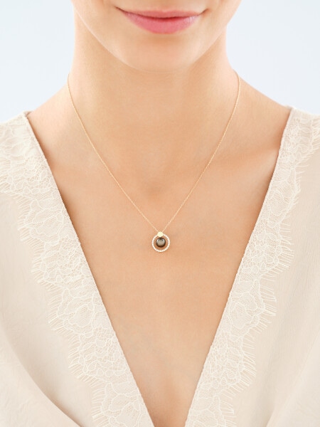 Złoty naszyjnik z perłą i cyrkoniami