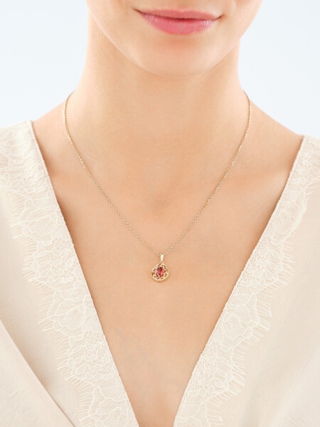 Złota zawieszka z cyrkoniami