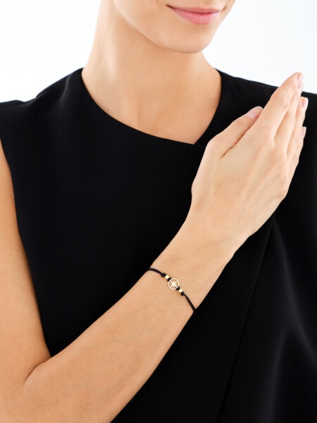 Bransoletka z elementami z żółtego złota - kompas