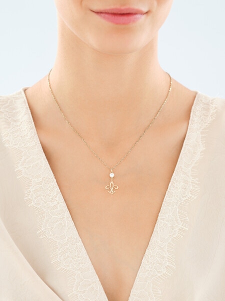 Złota zawieszka z cyrkonią - lilijka