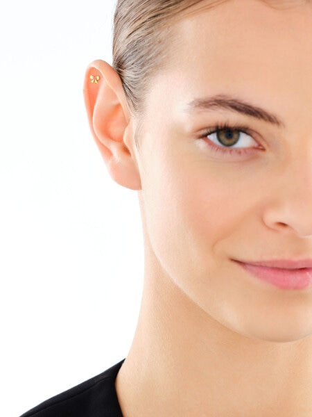 Pojedynczy srebrny kolczyk z cyrkonią - kokardka