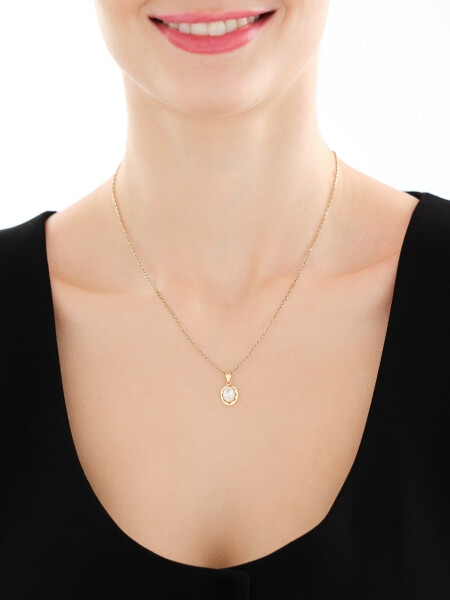 Złota zawieszka z cyrkonią